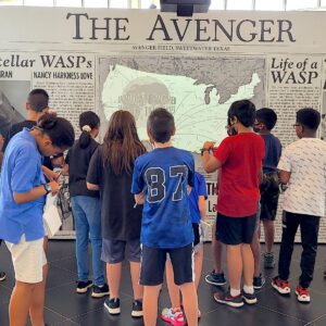 Dallas School kids as a field trip to WWII museum